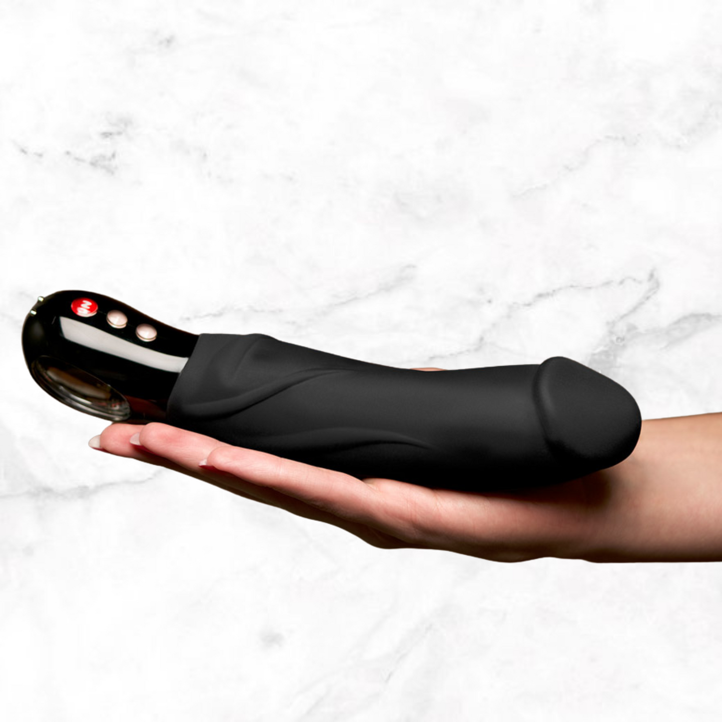 Big Boss in zwart op een hand, compacte ergonomische vorm van zacht siliconen