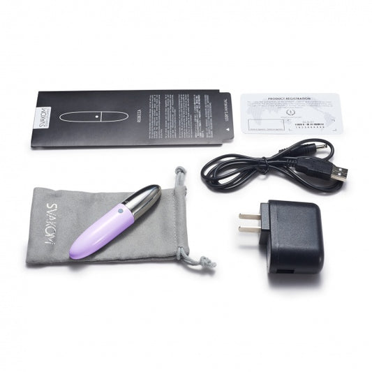 Svakom Rebecca vibrator in lila met verpakking, USB-kabel, oplader en opbergzakje