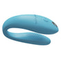 We-Vibe Sync Go verpakking met paarse vibrator en USB-oplaadkabel